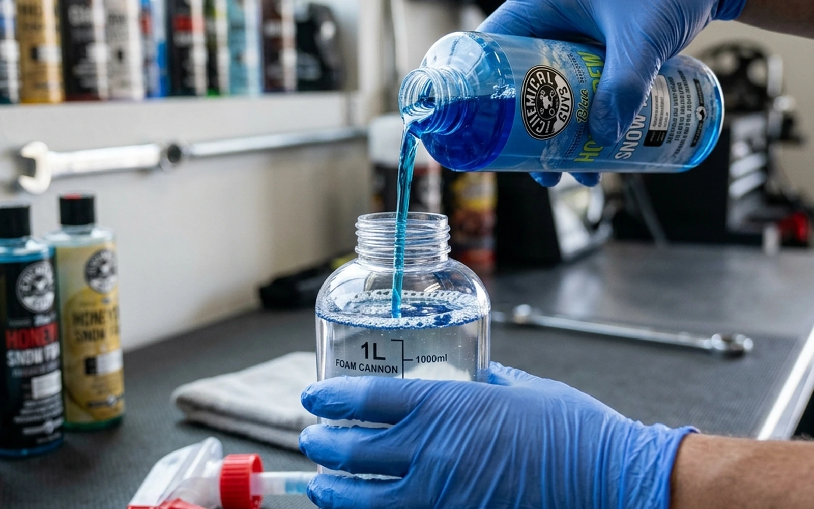 Measuring car wash soap before adding it to a foam cannon bottle