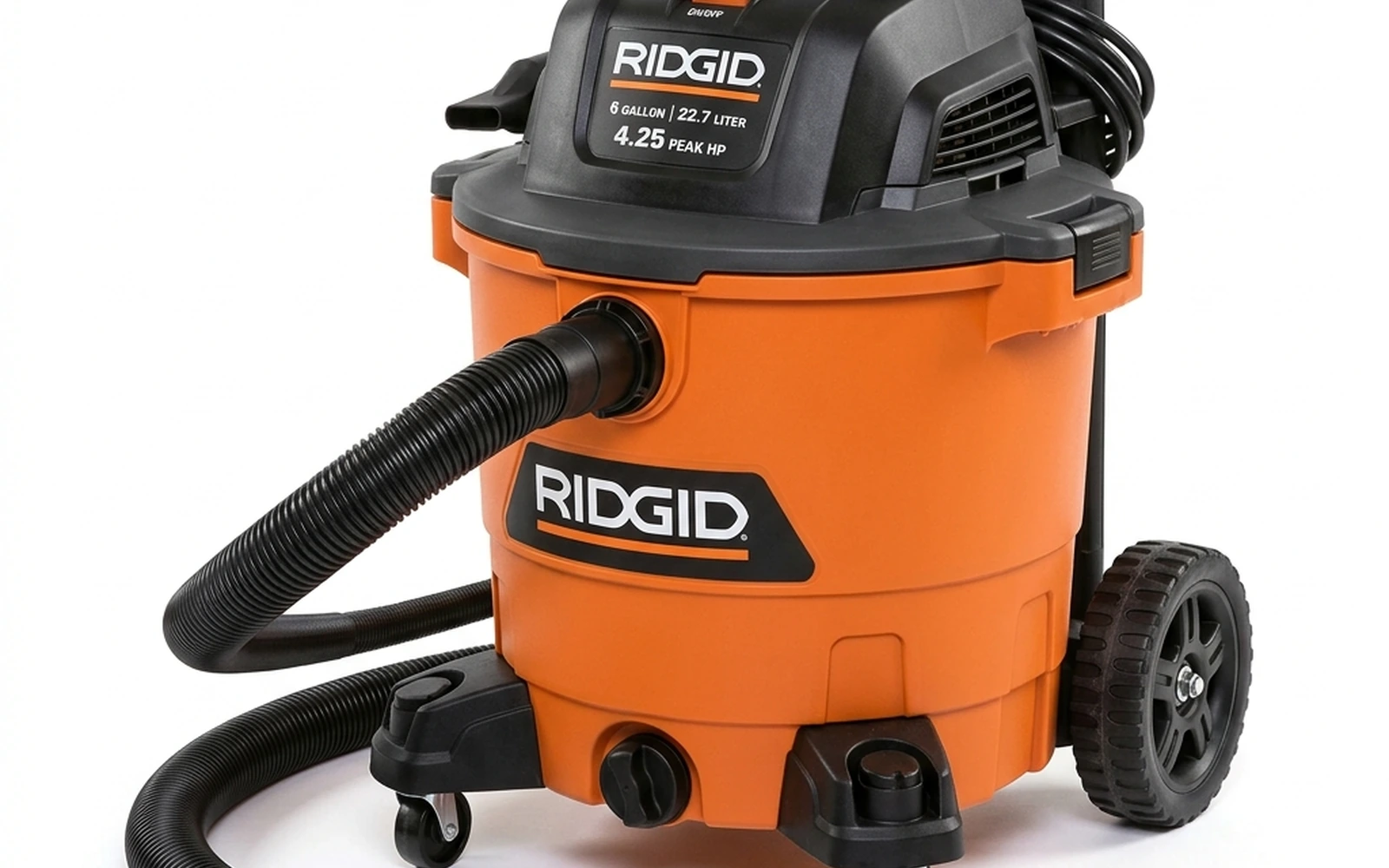Portable detailing vacuum stored in a tidy home garage
